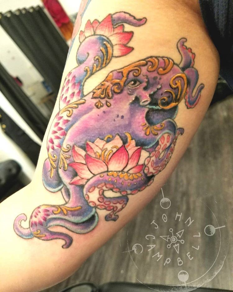 Colored Tattoo of Octopus with Lotus Flowers by Tattoo Artist John Campbell in Sacred Mandala Studio in Durham, North Carolina.